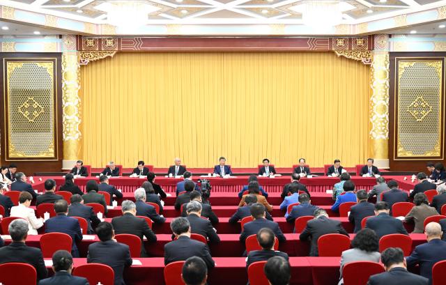 (260306) -- BEIJING, March 6, 2026 (Xinhua) -- Chinese President Xi Jinping, also general secretary of the Communist Party of China (CPC) Central Committee and chairman of the Central Military Commission, visits national political advisors from the Chinese Peasants and Workers Democratic Party, the Jiusan Society, the sector of medicine and health, and the sector of welfare and social security, who are attending the fourth session of the 14th National Committee of the Chinese People's Political Consultative Conference (CPPCC), in Beijing, capital of China, March 6, 2026. Xi attended their joint group meeting, and heard their comments and suggestions. Xi was accompanied by Wang Huning, chairman of the CPPCC National Committee, and Cai Qi, director of the General Office of the CPC Central Committee, who are both members of the Standing Committee of the Political Bureau of the CPC Central Committee. (Xinhua/Li Xiang)