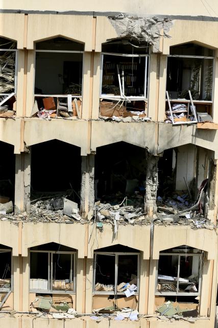 (260306) -- SIDON, March 6, 2026 (Xinhua) -- Photo taken on March 6, 2026 shows a building damaged by an Israeli airstrike in Sidon, southern Lebanon. Five people were killed, and seven others injured on Friday in an Israeli airstrike targeting the southern Lebanese city of Sidon, Lebanon's Health Ministry said. (Photo by Ali Hashisho/Xinhua)