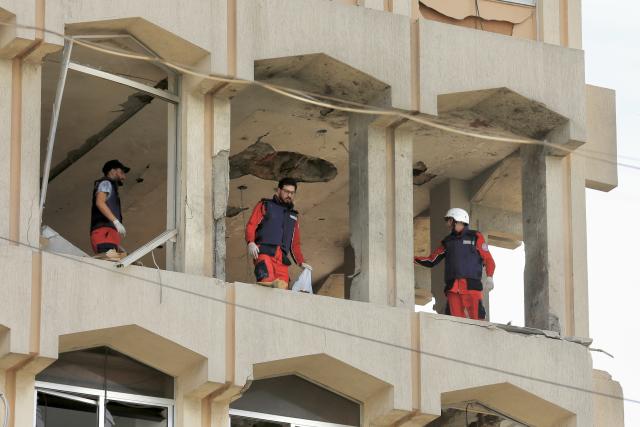 (260306) -- SIDON, March 6, 2026 (Xinhua) -- Photo taken on March 6, 2026 shows Lebanese rescue workers inspecting the site following an Israeli airstrike on a building in Sidon, southern Lebanon. Five people were killed, and seven others injured on Friday in an Israeli airstrike targeting the southern Lebanese city of Sidon, Lebanon's Health Ministry said. (Photo by Ali Hashisho/Xinhua)