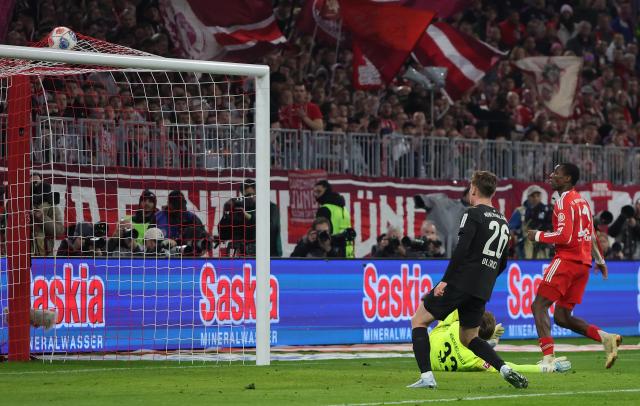 (260307) -- MUNICH, March 7, 2026 (Xinhua) -- Nicolas Jackson (R) of FC Bayern Munich shoots to score during the German first division Bundesliga football match between FC Bayern Munich and Borussia Moenchengladbach in Munich, Germany, March 6, 2026. (Photo by Philippe Ruiz/Xinhua)