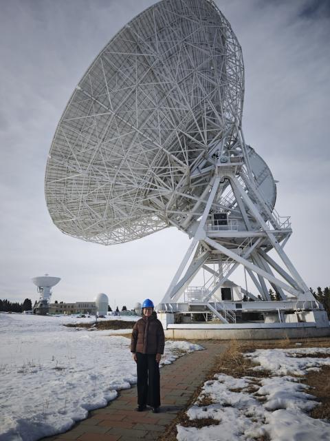 (260307) -- Beijing, March 7, 2026 (Xinhua) -- Guljaina Kazezkhan, a female engineer, poses for photos at Nanshan Station of the Xinjiang Astronomical Observatory under the Chinese Academy of Sciences, in Urumqi, northwest China's Xinjiang Uygur Autonomous Region, Feb. 11, 2026. She is among the 40 million women scientists, engineers, and technicians in China, who have made their mark on the country's innovation drive. (Xinhua/Jia Zhao)