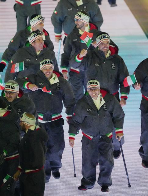 (260307) -- VERONA, March 7, 2026 (Xinhua) -- Members of the delegation of Italy parade during the opening ceremony of Milan-Cortina 2026 Paralympic Winter Games at Verona Olympic Arena in Verona, Italy, March 6, 2026. (Xinhua/Cai Yang)