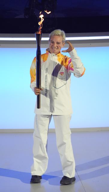 (260307) -- VERONA, March 7, 2026 (Xinhua) -- Torchbearer Bebe Vio is seen during the opening ceremony of Milan-Cortina 2026 Paralympic Winter Games at Verona Olympic Arena in Verona, Italy, March 6, 2026. (Xinhua/Cai Yang)