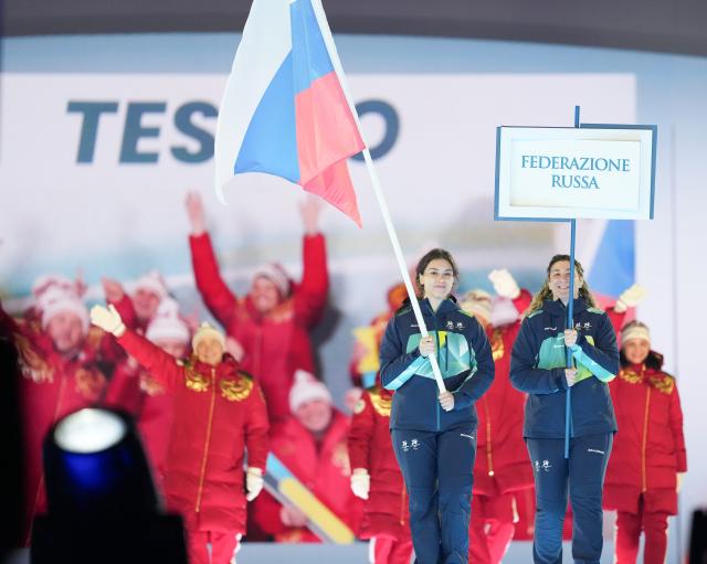 (260307) -- VERONA, March 7, 2026 (Xinhua) -- Members of the delegation of Russia parade during the opening ceremony of Milan-Cortina 2026 Paralympic Winter Games at Verona Olympic Arena in Verona, Italy, March 6, 2026. (Xinhua/Li Jing)