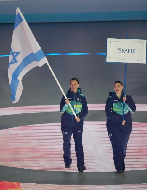 (260307) -- VERONA, March 7, 2026 (Xinhua) -- Members of the delegation of Israel parade during the opening ceremony of Milan-Cortina 2026 Paralympic Winter Games at Verona Olympic Arena in Verona, Italy, March 6, 2026. (Xinhua/Cai Yang)