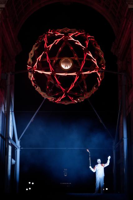 (260307) -- MILAN, March 7, 2026 (Xinhua) -- Gianmaria Dal Maistro of Italy ignites the cauldron of the Milan-Cortina 2026 Paralympic Winter Games at Arco della Pace in Milan, Italy, March 6, 2025. (Xinhua)