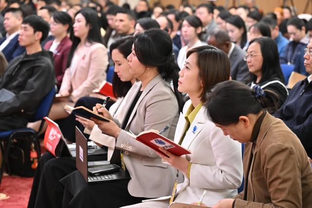 (260307) -- BEIJING, March 7, 2026 (Xinhua) -- Journalists work at a press conference for the fourth session of the 14th National People's Congress (NPC) on people's livelihood in Beijing, capital of China, March 7, 2026. (Xinhua/Li Xin)
