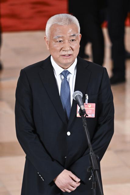 (260307) -- BEIJING, March 7, 2026 (Xinhua) -- Wang Zhigang, a member of the 14th National Committee of the Chinese People's Political Consultative Conference (CPPCC), attends a group interview ahead of the second plenary meeting of the fourth session of the 14th CPPCC National Committee at the Great Hall of the People in Beijing, capital of China, March 7, 2026. (Xinhua/Cao Yiming)