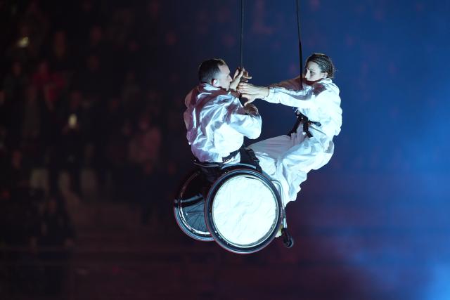 (260307) -- VERONA, March 7, 2026 (Xinhua) -- Actors perform during the opening ceremony of Milan-Cortina 2026 Paralympic Winter Games at Verona Olympic Arena in Verona, Italy, March 6, 2026. (Xinhua/Hou Jun)