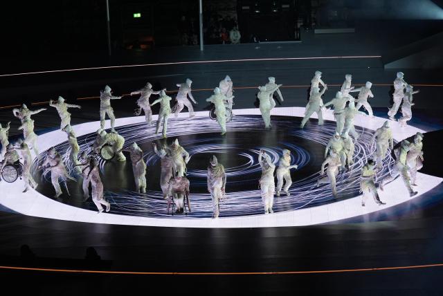 (260307) -- VERONA, March 7, 2026 (Xinhua) -- Actors perform during the opening ceremony of Milan-Cortina 2026 Paralympic Winter Games at Verona Olympic Arena in Verona, Italy, March 6, 2026. (Xinhua/Hou Jun)