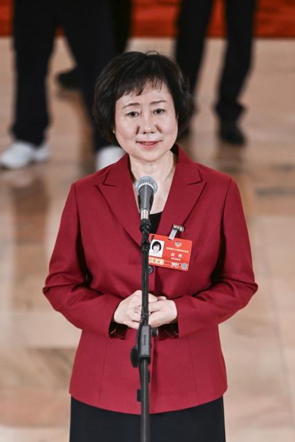(260307) -- BEIJING, March 7, 2026 (Xinhua) -- Zhao Mei, a member of the 14th National Committee of the Chinese People's Political Consultative Conference (CPPCC), attends a group interview ahead of the second plenary meeting of the fourth session of the 14th CPPCC National Committee at the Great Hall of the People in Beijing, capital of China, March 7, 2026. (Xinhua/Cao Yiming)