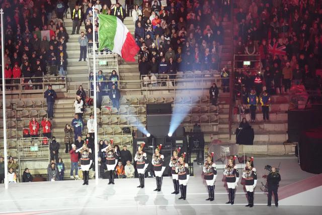 (260307) -- VERONA, March 7, 2026 (Xinhua) -- Italian national flag is raised during during the opening ceremony of Milan-Cortina 2026 Paralympic Winter Games at Verona Olympic Arena in Verona, Italy, March 6, 2026. (Xinhua/Hou Jun)