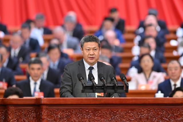 (260307) -- BEIJING, March 7, 2026 (Xinhua) -- Huang Qunhui, a member of the 14th National Committee of the Chinese People's Political Consultative Conference (CPPCC), speaks at the second plenary meeting of the fourth session of the 14th CPPCC National Committee at the Great Hall of the People in Beijing, capital of China, March 7, 2026. (Xinhua/Liu Weibing)