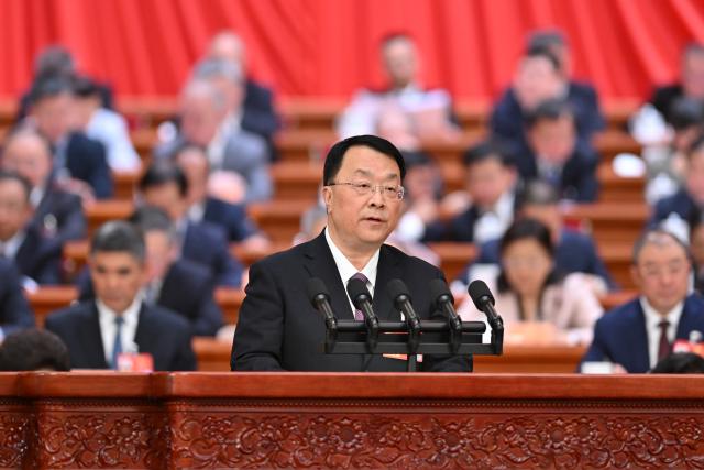 (260307) -- BEIJING, March 7, 2026 (Xinhua) -- Cheng Jianping, a member of the 14th National Committee of the Chinese People's Political Consultative Conference (CPPCC), speaks at the second plenary meeting of the fourth session of the 14th CPPCC National Committee at the Great Hall of the People in Beijing, capital of China, March 7, 2026. (Xinhua/Yue Yuewei)