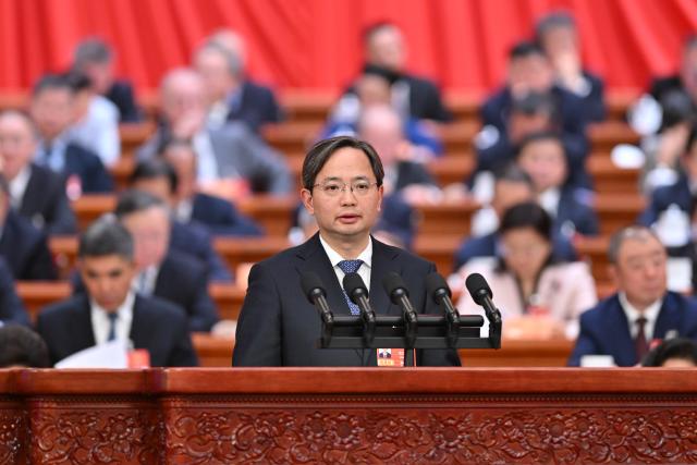 (260307) -- BEIJING, March 7, 2026 (Xinhua) -- Zhou Zhihua, a member of the 14th National Committee of the Chinese People's Political Consultative Conference (CPPCC), speaks at the second plenary meeting of the fourth session of the 14th CPPCC National Committee at the Great Hall of the People in Beijing, capital of China, March 7, 2026. (Xinhua/Li Tao)