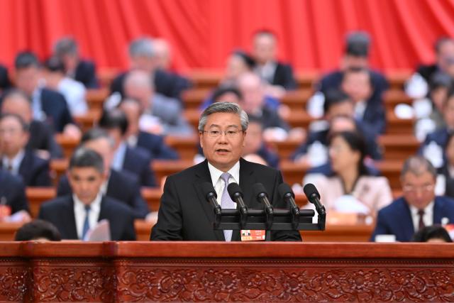 (260307) -- BEIJING, March 7, 2026 (Xinhua) -- Li Rongcan, a member of the 14th National Committee of the Chinese People's Political Consultative Conference (CPPCC), speaks at the second plenary meeting of the fourth session of the 14th CPPCC National Committee at the Great Hall of the People in Beijing, capital of China, March 7, 2026. (Xinhua/Li Tao)