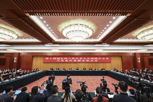 (260307) -- BEIJING, March 7, 2026 (Xinhua) -- A group meeting of deputies from the delegation of Jiangsu Province is held at the fourth session of the 14th National People's Congress (NPC) in Beijing, capital of China, March 7, 2026. (Xinhua/Cai Xiangxin)