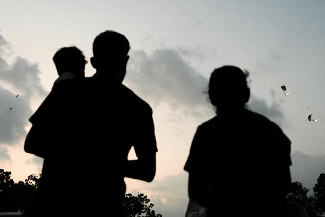(260307) -- COLOMBO, March 7, 2026 (Xinhua) -- People attend the exhibition and air show to mark the 75th anniversary of the Sri Lanka Air Force in Colombo, Sri Lanka, on March 6, 2026. (Photo by Thilina Kaluthotage/Xinhua)