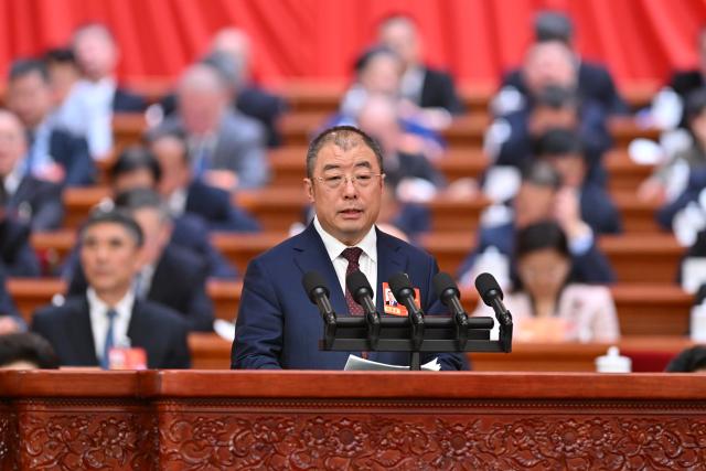 (260307) -- BEIJING, March 7, 2026 (Xinhua) -- Qi Xiangdong, a member of the 14th National Committee of the Chinese People's Political Consultative Conference (CPPCC), speaks at the second plenary meeting of the fourth session of the 14th CPPCC National Committee at the Great Hall of the People in Beijing, capital of China, March 7, 2026. (Xinhua/Li Tao)