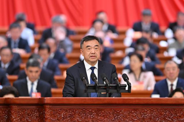 (260307) -- BEIJING, March 7, 2026 (Xinhua) -- Mo Rong, a member of the 14th National Committee of the Chinese People's Political Consultative Conference (CPPCC), speaks at the second plenary meeting of the fourth session of the 14th CPPCC National Committee at the Great Hall of the People in Beijing, capital of China, March 7, 2026. (Xinhua/Yue Yuewei)