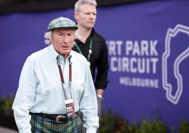 (260307) -- MELBOURNE, March 7, 2026 (Xinhua) -- Former British Formula One World Champion Jackie Stewart arrives at the paddock before the qualifying session of the Formula One Australia Grand Prix at Albert Park in Melbourne, Australia, March 7, 2026. (Xinhua/Ma Ping)