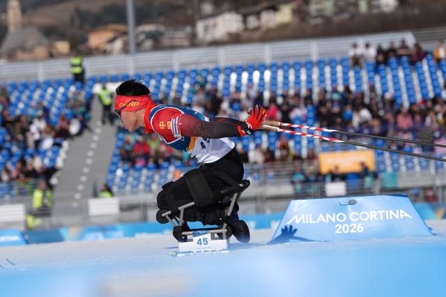 (260307) -- TESERO, March 7, 2026 (Xinhua) -- Liu Mengtao of China competes during the men's sprint sitting final of para biathon at the Milan-Cortina 2026 Paralympic Winter Games in Tesero, Italy, March 7, 2026. (Xinhua/Hou Zhaokang)