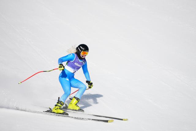 (260307) -- CORTINA D'AMPEZZO, March 7, 2026 (Xinhua) -- Martina Vozza of Italy competes during para alpine skiing women's downhill vision impaired match at the Milan-Cortina 2026 Paralympic Winter Games in Cortina D'ampezzo, Italy, March 7, 2026. (Xinhua/Wang Kaiyan)