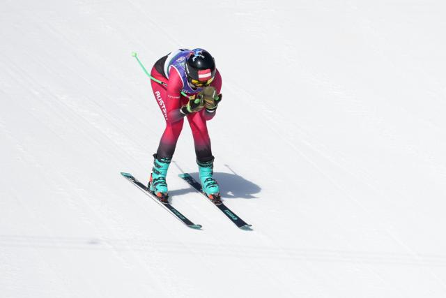 (260307) -- CORTINA D'AMPEZZO, March 7, 2026 (Xinhua) -- Veronika Aigner of Austria competes during para alpine skiing women's downhill vision impaired match at the Milan-Cortina 2026 Paralympic Winter Games in Cortina D'ampezzo, Italy, March 7, 2026. (Xinhua/Wang Kaiyan)