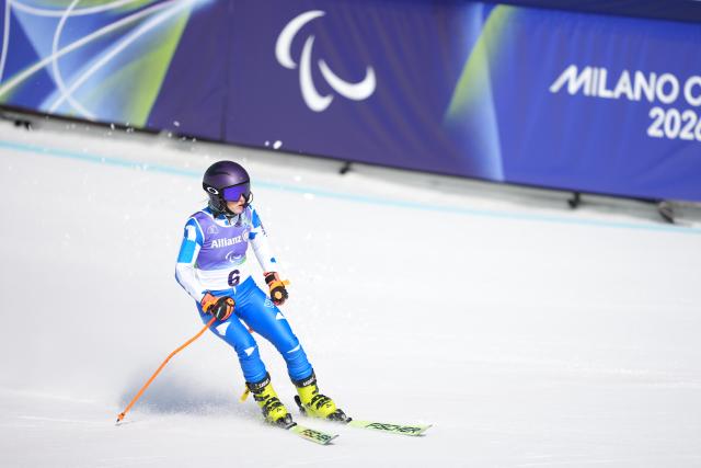 (260307) -- CORTINA D'AMPEZZO, March 7, 2026 (Xinhua) -- Eva Nikou of Greece competes during para alpine skiing women's downhill vision impaired match at the Milan-Cortina 2026 Paralympic Winter Games in Cortina D'ampezzo, Italy, March 7, 2026. (Xinhua/Wang Kaiyan)