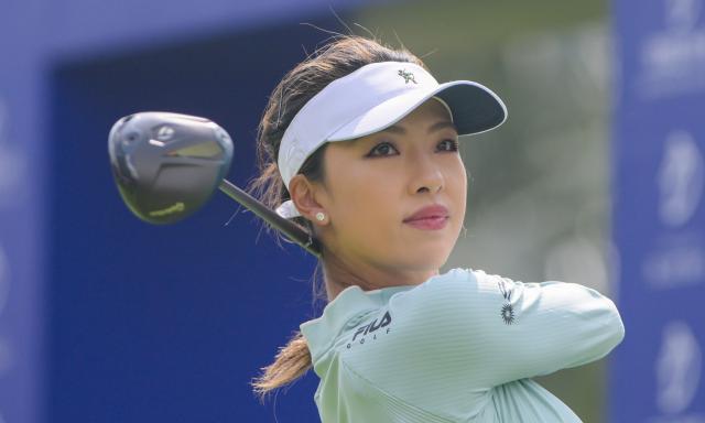 (260307) -- LINGSHUI, March 7, 2026 (Xinhua) -- He Muni of China plays a shot during the third round of the Blue Bay LPGA golf tournament in Lingshui, south China's Hainan Province, March 7, 2026. (Xinhua/Yang Guanyu)