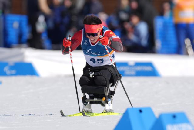 (260307) -- TESERO, March 7, 2026 (Xinhua) -- Liu Mengtao of China competes during the men's sprint sitting final of para biathon at the Milan-Cortina 2026 Paralympic Winter Games in Tesero, Italy, March 7, 2026. (Xinhua/Cai Yang)