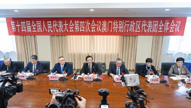 (260307) -- BEIJING, March 7, 2026 (Xinhua) -- A group meeting of deputies from the delegation of the Macao Special Administrative Region is held at the fourth session of the 14th National People's Congress (NPC) in Beijing, capital of China, March 7, 2026. (Xinhua/Li Minggang)