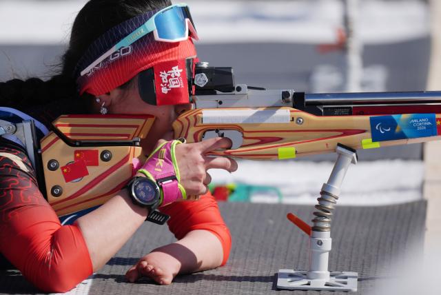 (260307) -- TESERO, March 7, 2026 (Xinhua) -- Guo Yujie of China competes during the women's sprint standing final of para biathon at the Milan-Cortina 2026 Paralympic Winter Games in Tesero, Italy, March 7, 2026. (Xinhua/Cai Yang)