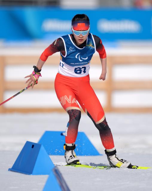 (260307) -- TESERO, March 7, 2026 (Xinhua) -- Guo Yujie of China competes during the women's sprint standing final of para biathon at the Milan-Cortina 2026 Paralympic Winter Games in Tesero, Italy, March 7, 2026. (Xinhua/Cai Yang)