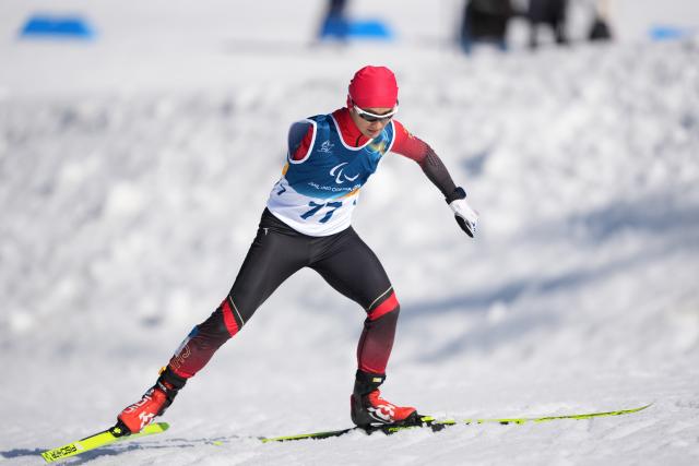 (260307) -- TESERO, March 7, 2026 (Xinhua) -- Yuan Mingshou of China competes during the men's sprint standing final of para biathon at the Milan-Cortina 2026 Paralympic Winter Games in Tesero, Italy, March 7, 2026. (Xinhua/Lian Zhen)