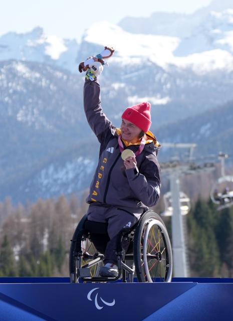 (260307) -- CORTINA D'AMPEZZO, March 7, 2026 (Xinhua) -- Anna-Lena Forster of Germany celebrates during awarding ceremony for the para alpine skiing women's downhill sitting match at the Milan-Cortina 2026 Paralympic Winter Games in Cortina D'ampezzo, Italy, March 7, 2026. (Xinhua/Wang Kaiyan)