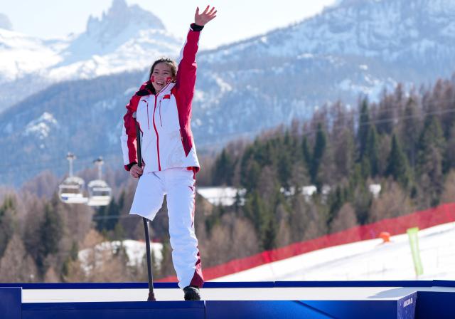 (260307) -- CORTINA D'AMPEZZO, March 7, 2026 (Xinhua) -- Liu Sitong of China celebrates during awarding ceremony for the para alpine skiing women's downhill sitting match at the Milan-Cortina 2026 Paralympic Winter Games in Cortina D'ampezzo, Italy, March 7, 2026. (Xinhua/Wang Kaiyan)