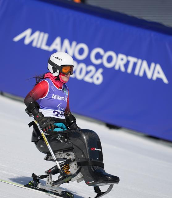 (260307) -- CORTINA D'AMPEZZO, March 7, 2026 (Xinhua) -- Liu Sitong of China competes during the para alpine skiing women's downhill sitting match at the Milan-Cortina 2026 Paralympic Winter Games in Cortina D'ampezzo, Italy, March 7, 2026. (Xinhua/Wang Kaiyan)