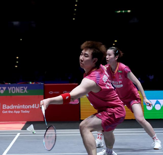 (260307) -- BIRMINGHAM, March 7, 2026 (Xinhua) -- Guo Xinwa (L)/Chen Fanghui compete during the mixed doubles semifinal between Guo Xinwa/Chen Fanghui of China and Thom Gicquel/Delphine Delrue of France at the All England Open Badminton Championships 2026 in Birmingham, Britain, March 7, 2026. (Xinhua/Li Ying)