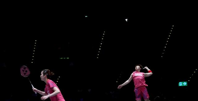 (260307) -- BIRMINGHAM, March 7, 2026 (Xinhua) -- Guo Xinwa (R)/Chen Fanghui compete during the mixed doubles semifinal between Guo Xinwa/Chen Fanghui of China and Thom Gicquel/Delphine Delrue of France at the All England Open Badminton Championships 2026 in Birmingham, Britain, March 7, 2026. (Xinhua/Li Ying)