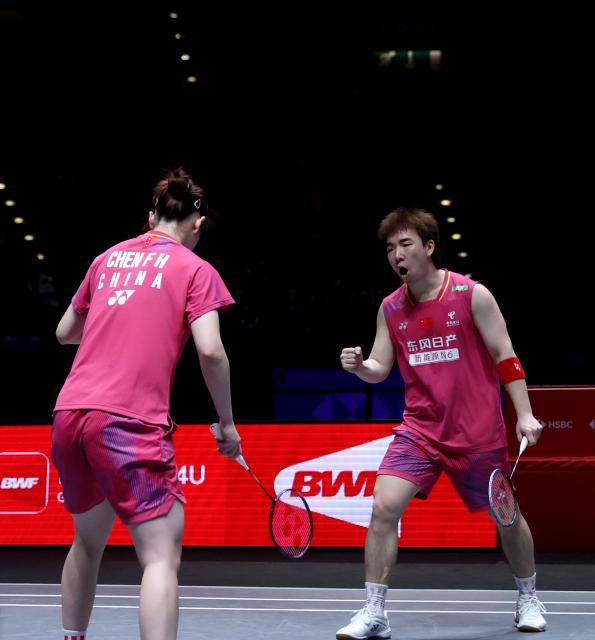 (260307) -- BIRMINGHAM, March 7, 2026 (Xinhua) -- Guo Xinwa (R)/Chen Fanghui celebrate scoring during the mixed doubles semifinal between Guo Xinwa/Chen Fanghui of China and Thom Gicquel/Delphine Delrue of France at the All England Open Badminton Championships 2026 in Birmingham, Britain, March 7, 2026. (Xinhua/Li Ying)