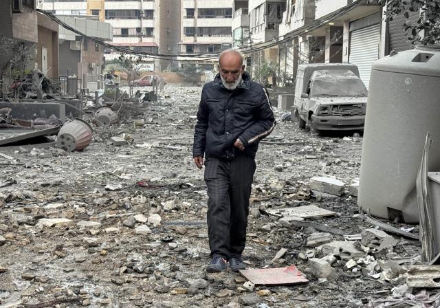 (260308) -- BEIRUT, March 8, 2026 (Xinhua) -- A man walks among the rubble after Israeli attacks in the southern suburbs of Beirut, Lebanon, March 7, 2026.
  The number of displaced people registered through Lebanon's government relief platform has reached about 454,000, Minister of Social Affairs Haneen Sayed said on Saturday, as Israel continues to attack several areas of the country.
  The death toll from Israeli attacks on Lebanon since early Monday has risen to 294, with 1,023 people injured, Lebanon's authorities said Saturday. (Photo by Bilal Jawich/Xinhua)