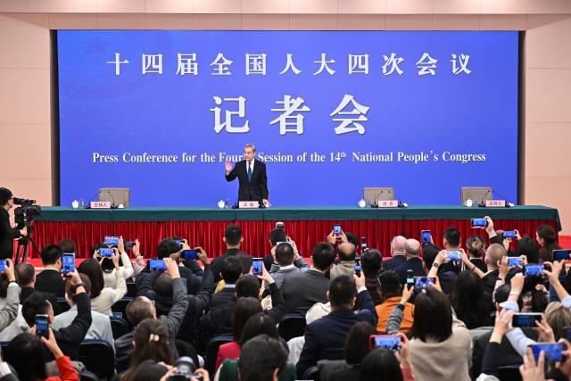 (260308) -- BEIJING, March 8, 2026 (Xinhua) -- Chinese Foreign Minister Wang Yi, also a member of the Political Bureau of the Communist Party of China Central Committee, attends a press conference on China's foreign policy and external relations on the sidelines of the fourth session of the 14th National People's Congress (NPC) in Beijing, capital of China, March 8, 2026. (Xinhua/Li Xin)