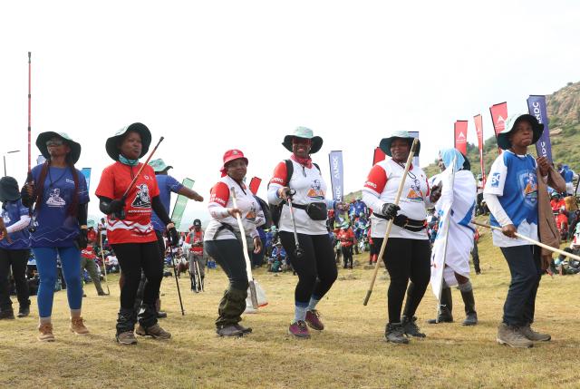 (260308) -- MENKHOANENG,, March 8, 2026 (Xinhua) -- People cheer during the Moshoeshoe Walk 2026 in Menkhoaneng, Lesotho, March 5, 2026.
  The Moshoeshoe Walk 2026, a 116-km trek from Thursday to Saturday, retraces the historic route taken more than two centuries ago by King Moshoeshoe I, the founding father of the Basotho nation, which became the Kingdom of Lesotho in 1966 after gaining independence from the United Kingdom.
  TO GO WITH "Feature: Lesotho's Moshoeshoe Walk unites culture, community, and cross-border friendship" (Xinhua/Chen Wei)