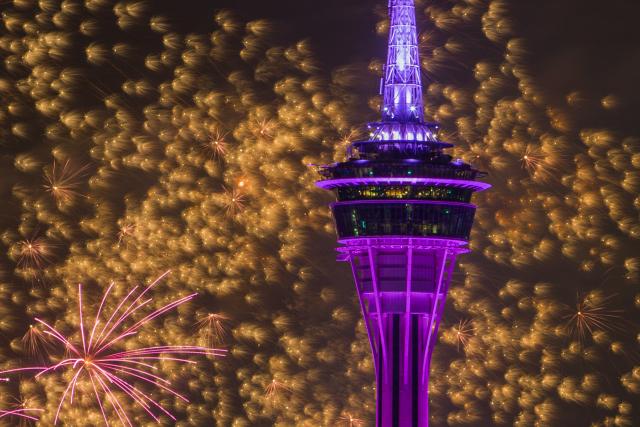 (260308) -- BEIJING, March 8, 2026 (Xinhua) -- This photo taken on March 7, 2026 shows a fireworks show above the sea near Macao Tower in Macao, south China. (Xinhua/Cheong Kam Ka)
