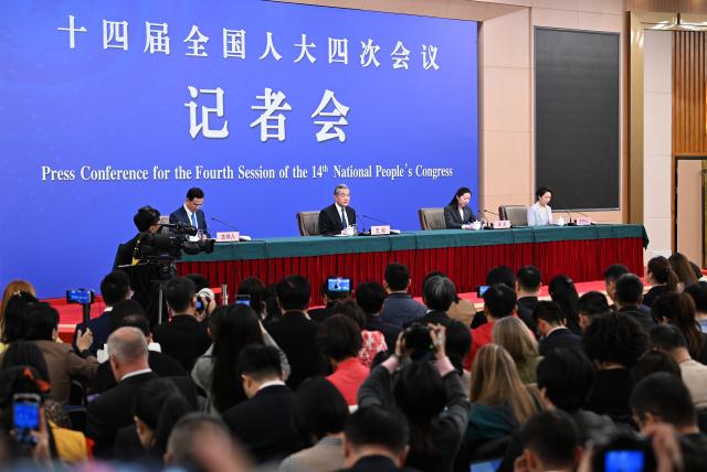 (260308) -- BEIJING, March 8, 2026 (Xinhua) -- Chinese Foreign Minister Wang Yi, also a member of the Political Bureau of the Communist Party of China Central Committee, attends a press conference on China's foreign policy and external relations on the sidelines of the fourth session of the 14th National People's Congress (NPC) in Beijing, capital of China, March 8, 2026. (Xinhua/Cao Yiming)