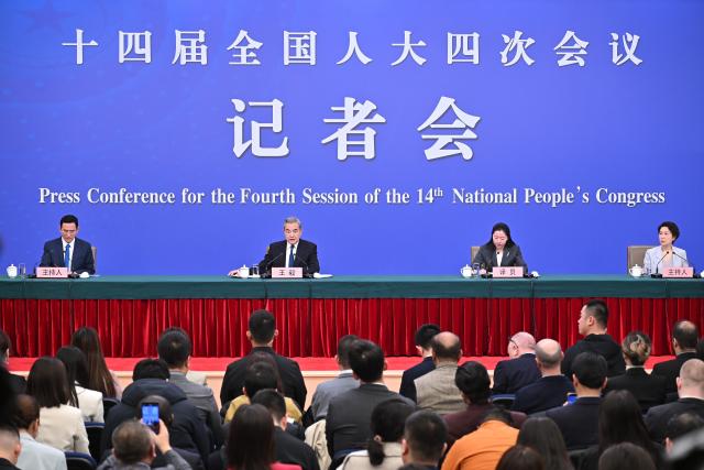 (260308) -- BEIJING, March 8, 2026 (Xinhua) -- Chinese Foreign Minister Wang Yi, also a member of the Political Bureau of the Communist Party of China Central Committee, attends a press conference on China's foreign policy and external relations on the sidelines of the fourth session of the 14th National People's Congress (NPC) in Beijing, capital of China, March 8, 2026. (Xinhua/Li Xin)