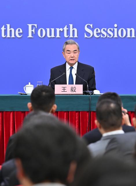 (260308) -- BEIJING, March 8, 2026 (Xinhua) -- Chinese Foreign Minister Wang Yi, also a member of the Political Bureau of the Communist Party of China Central Committee, attends a press conference on China's foreign policy and external relations on the sidelines of the fourth session of the 14th National People's Congress (NPC) in Beijing, capital of China, March 8, 2026. (Xinhua/Li Xin)