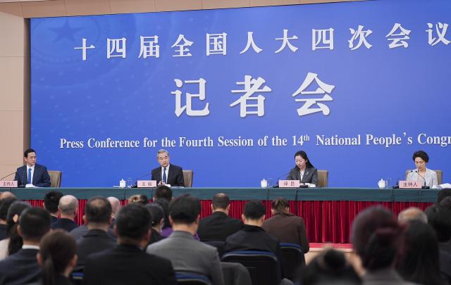 (260308) -- BEIJING, March 8, 2026 (Xinhua) -- Chinese Foreign Minister Wang Yi, also a member of the Political Bureau of the Communist Party of China Central Committee, attends a press conference on China's foreign policy and external relations on the sidelines of the fourth session of the 14th National People's Congress (NPC) in Beijing, capital of China, March 8, 2026. (Xinhua/Fu Tian)