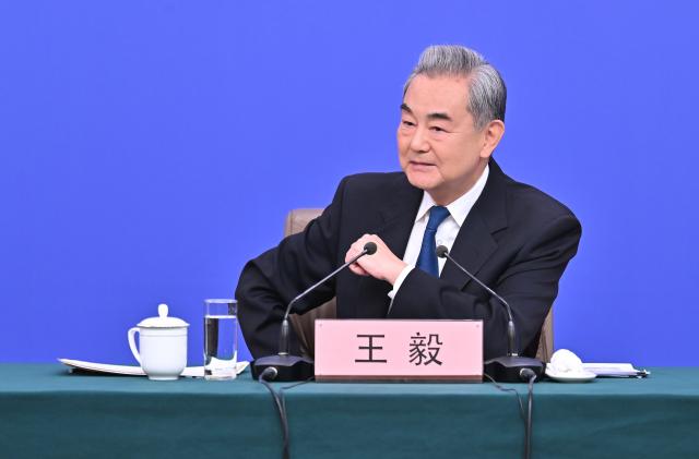 (260308) -- BEIJING, March 8, 2026 (Xinhua) -- Chinese Foreign Minister Wang Yi, also a member of the Political Bureau of the Communist Party of China Central Committee, attends a press conference on China's foreign policy and external relations on the sidelines of the fourth session of the 14th National People's Congress (NPC) in Beijing, capital of China, March 8, 2026. (Xinhua/Li Xin)